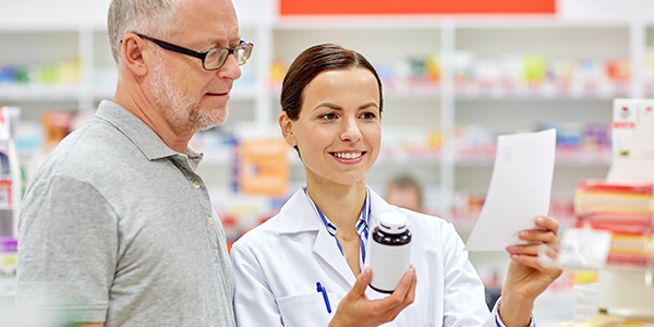 Pharmacist and Elderly Man